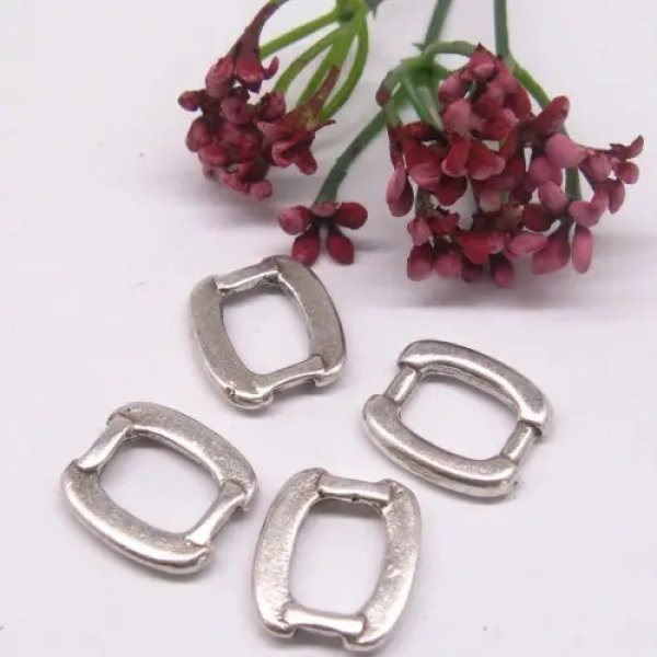 Posrebrzane - Metalowy element ozdobny 16x14 mm