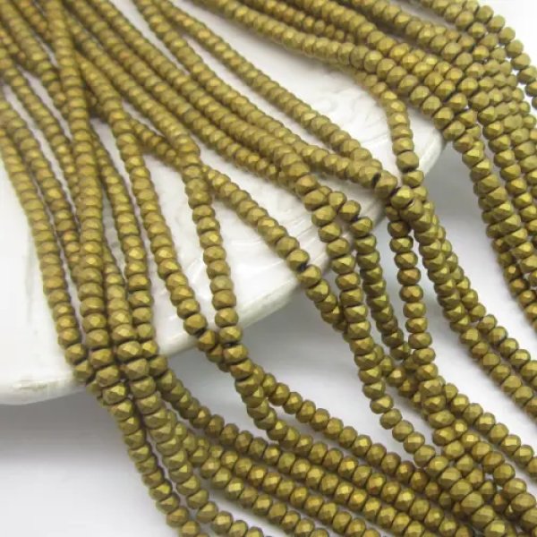 Hematyt złoty matowy fasetowany - oponki 3x2mm (sznurek)