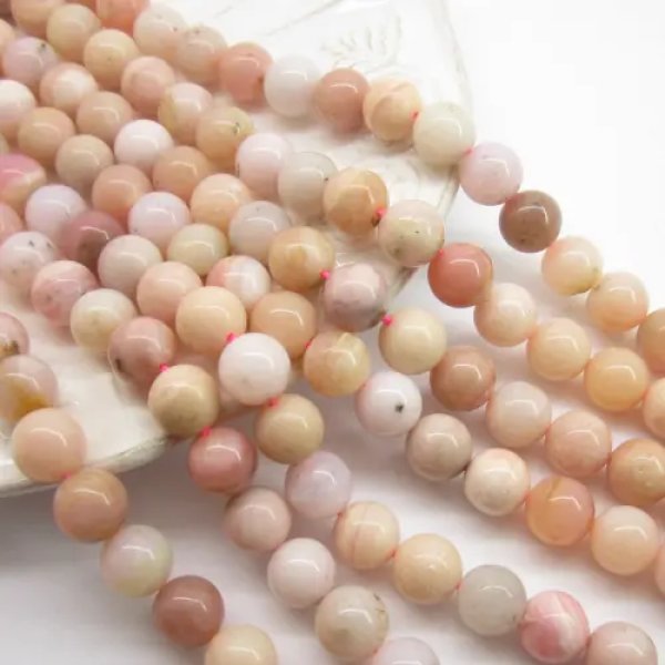 Opal Różowy kulki 10mm(sznurek)