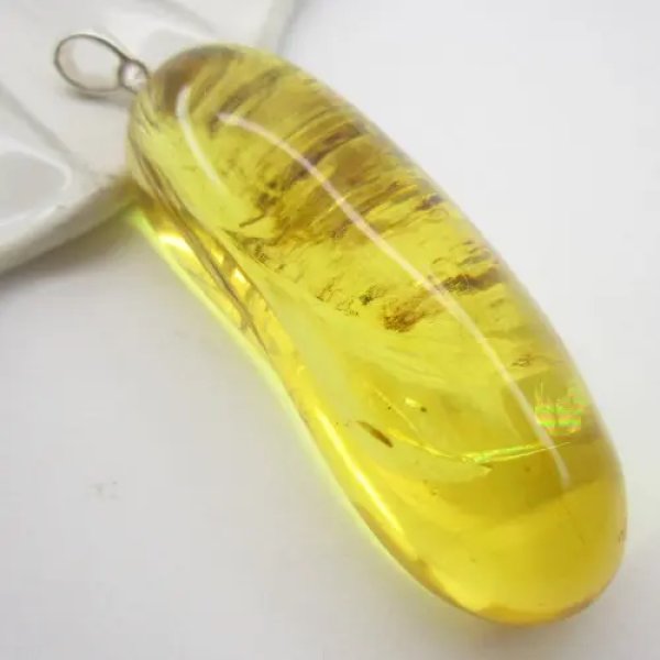 Bursztyn z inkluzjami i srebro - zawieszka