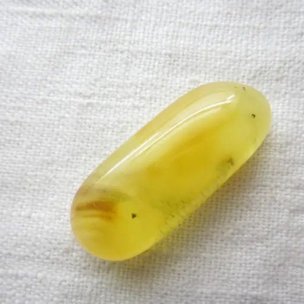 Bursztyn 45x18x11 mm zaokrąglony prostokąt