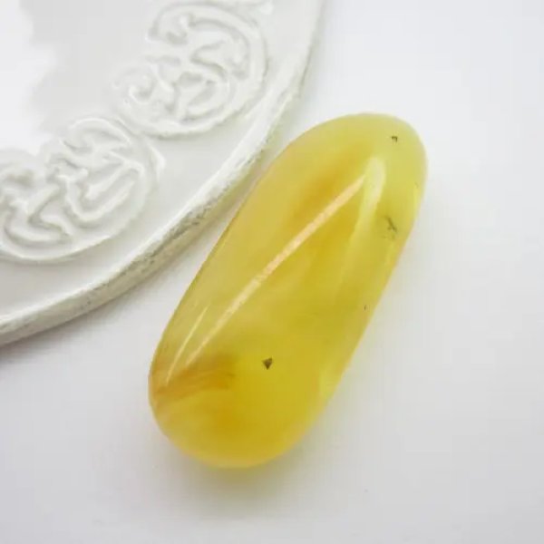 Bursztyn 45x18x11 mm zaokrąglony prostokąt