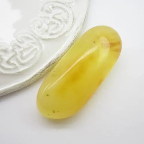 Bursztyn 45x18x11 mm zaokrąglony prostokąt