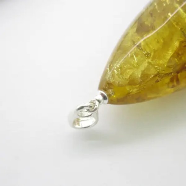 Bursztyn z inkluzją i owadem i srebro - zawieszka