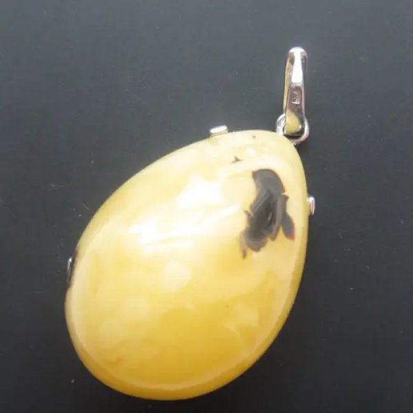 Bursztyn mleczny z pirytem i srebro rodowane - zawieszka łza