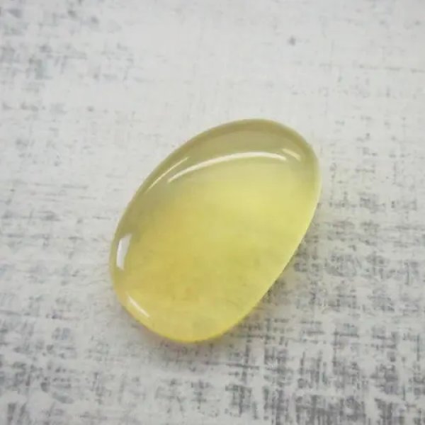 Mleczny Bursztyn owal 29x19x8mm