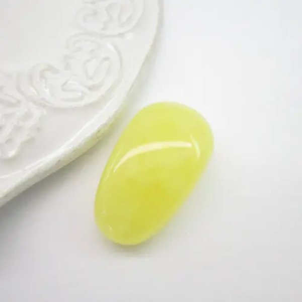 Mleczny Bursztyn owal 32x18x11mm