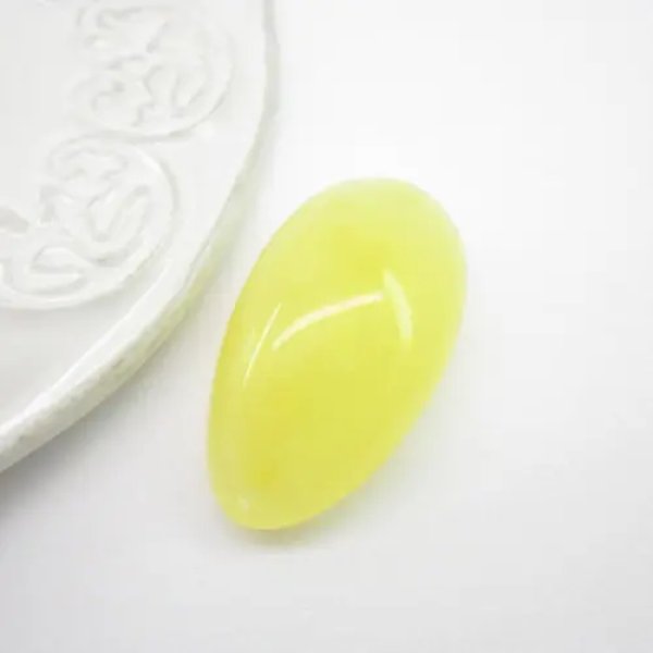 Mleczny Bursztyn owal 35x20x12mm