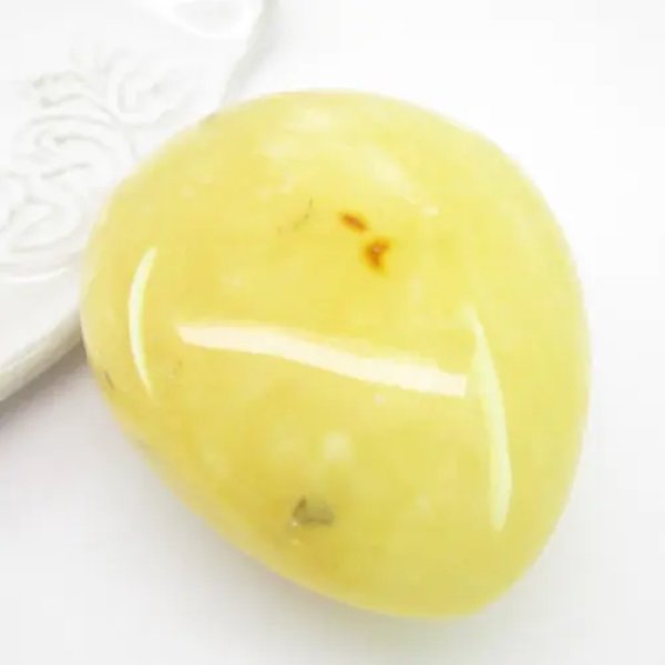 Mleczny Bursztyn łza 49x41x22mm (Duży)