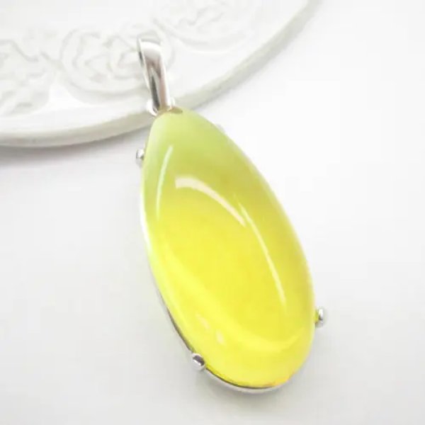 Bursztyn w srebrze rodowanym - wisiorek + rzemień