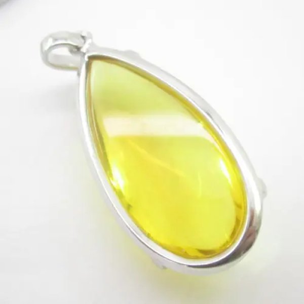 Bursztyn w srebrze rodowanym - wisiorek + rzemień