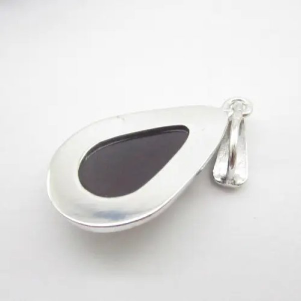 Koniakowy Bursztyn i srebro rodowane - zawieszka łza