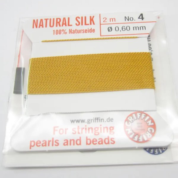 Nici Jedwabne żółte bursztynowe z igłą - 0,6mm/2 metry