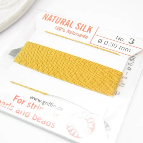 Nici Jedwabne żółte bursztynowe z igłą - 0,5mm/2 metry