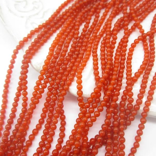 Onyks czerwony kulka 2 mm – sznur ok. 38 cm
