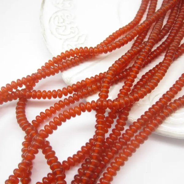 Onyks czerwony oponka 4x2 mm – sznur ok. 38 cm