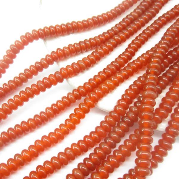 Onyks czerwony oponka 6x4 mm – sznurek ok. 38 cm