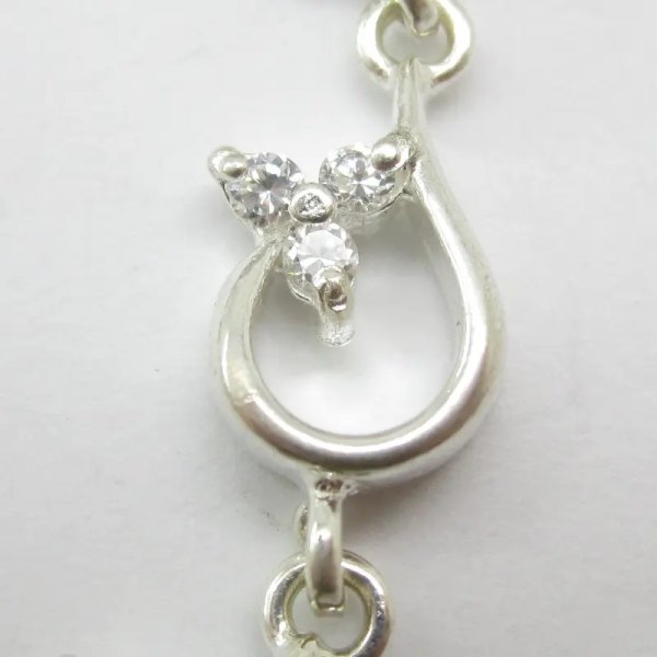 Cyrkonie w srebrze - bransoleta kwiatki