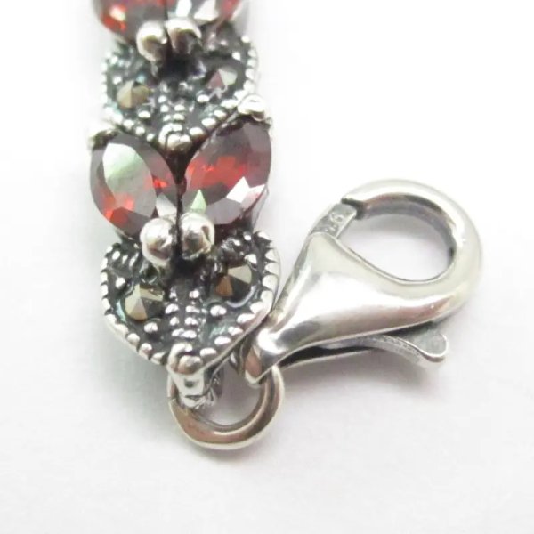 Granat fasetowany i markezyty w srebrze oksydowanym - bransoletka