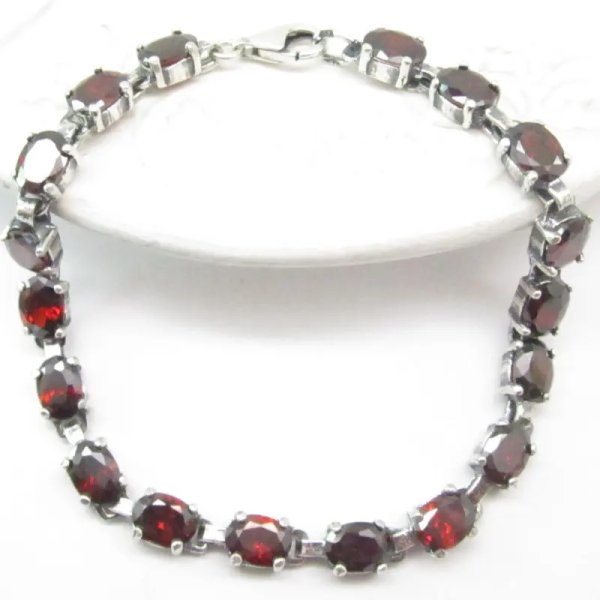 Granat fasetowany w srebrze oksydowanym - bransoletka owale