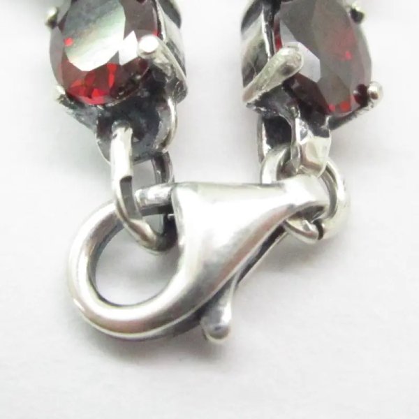 Granat fasetowany w srebrze oksydowanym - bransoletka owale