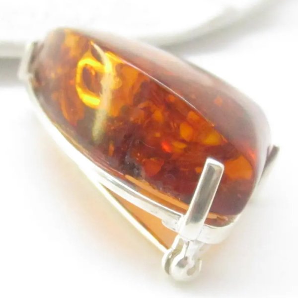 Koniakowy Bursztyn z łuskami i srebro - broszka