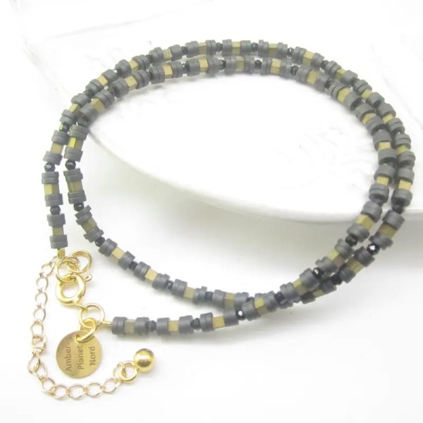 Onyks fasetowany, Hematyt i srebro złocone - naszyjnik typu choker