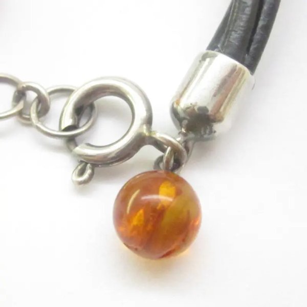 Bursztyn koniakowy, rzemień i srebro oksydowane - bransoletka