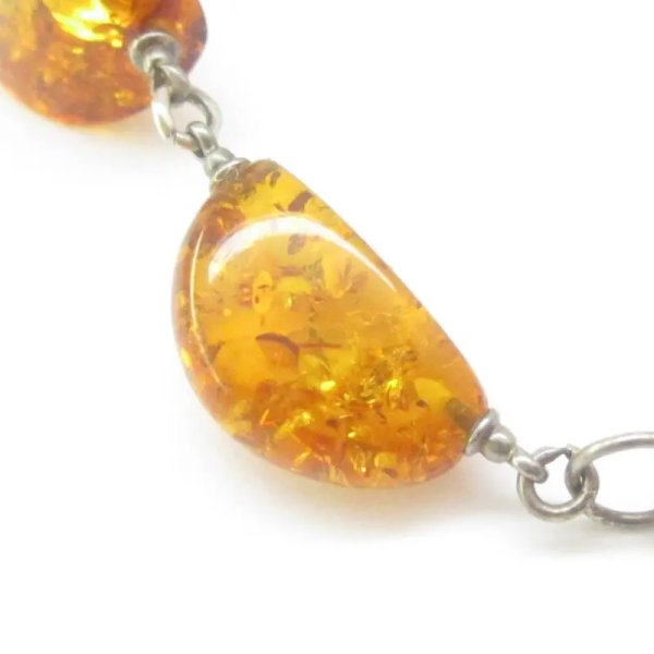 Bursztyn koniakowy, rzemień i srebro oksydowane - bransoletka