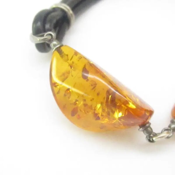 Bursztyn koniakowy, rzemień i srebro oksydowane - bransoletka