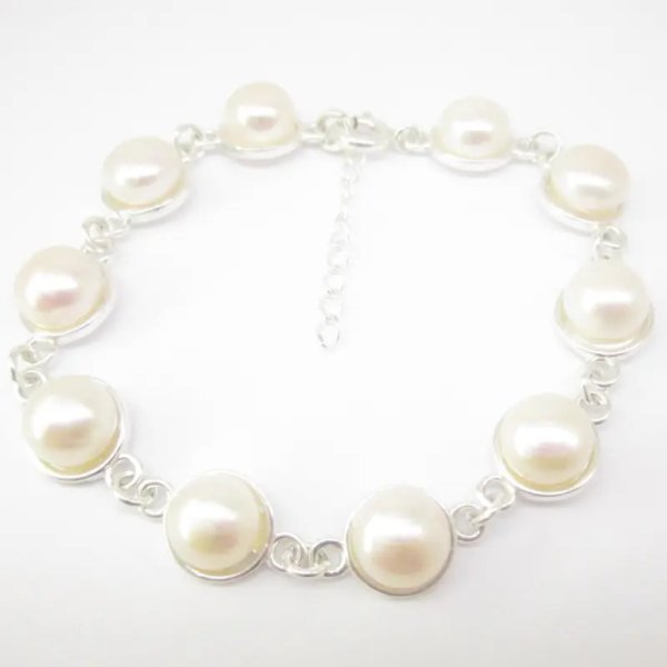Perła biała i srebro - bransoletka koła - 18 cm + 3 cm dodatkowej regulacji.