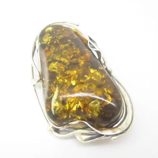 Zielony bursztyn z łuskami i srebro oksydowane - broszka