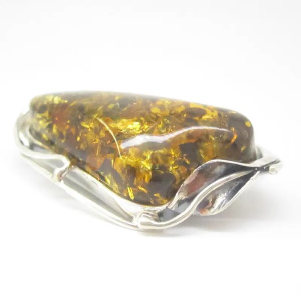 Zielony bursztyn z łuskami i srebro oksydowane - broszka