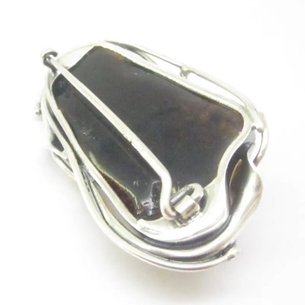 Zielony bursztyn z łuskami i srebro oksydowane - broszka