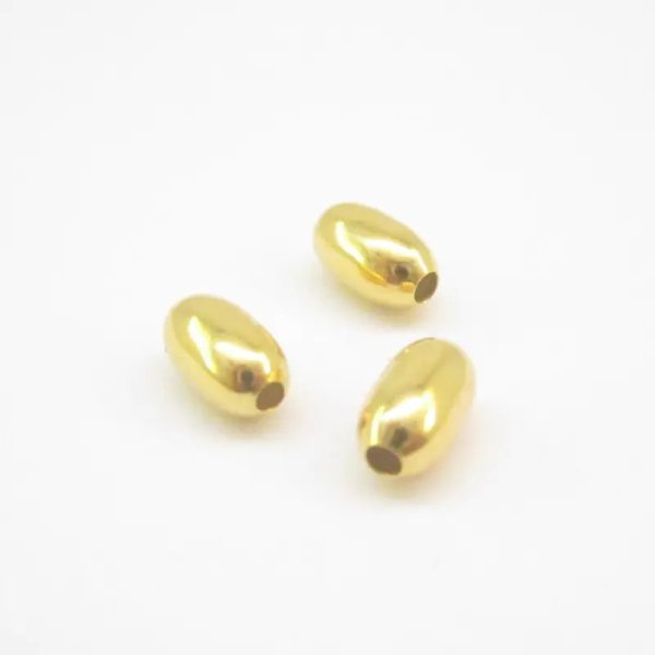 Srebro złocone Ag - element ozdobny ryż 6x4 mm  