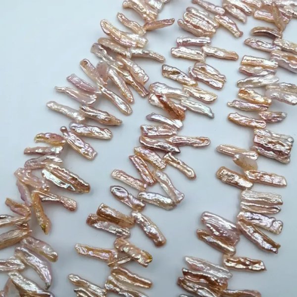 Perły naturalne hodowane różowe patyczki 16–25×6 mm – sznur ok. 38 cm