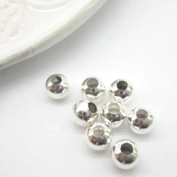 Metalowy element ozdobny - przekładka kulka 6 mm 