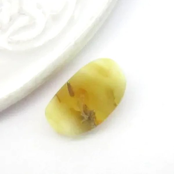 Bursztyn 18x10,5x7 mm owal