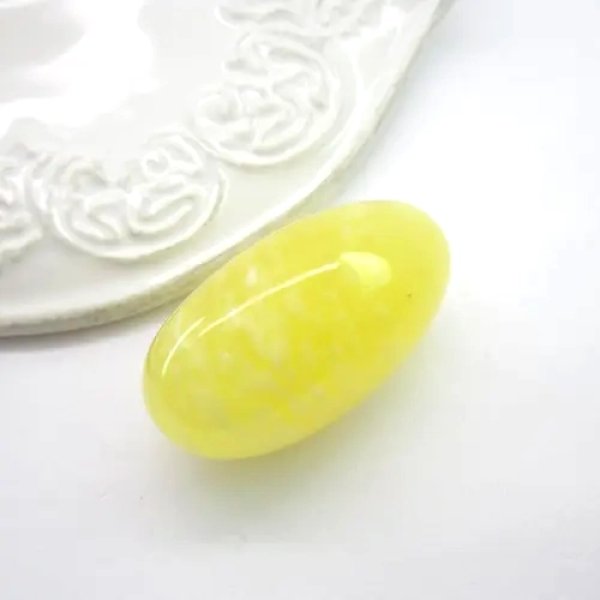 Mleczny Bursztyn 37x19x18 mm owal