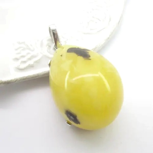 Bursztyn mleczny z pirytem i srebro rodowane - zawieszka łza