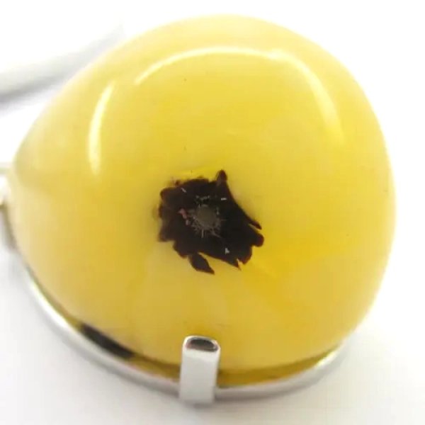 Bursztyn mleczny z pirytem i srebro rodowane - zawieszka łza