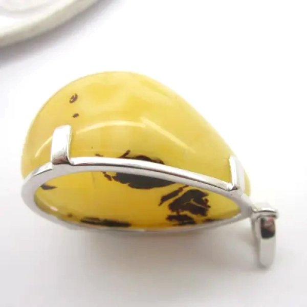 Bursztyn mleczny z pirytem i srebro rodowane - zawieszka łza