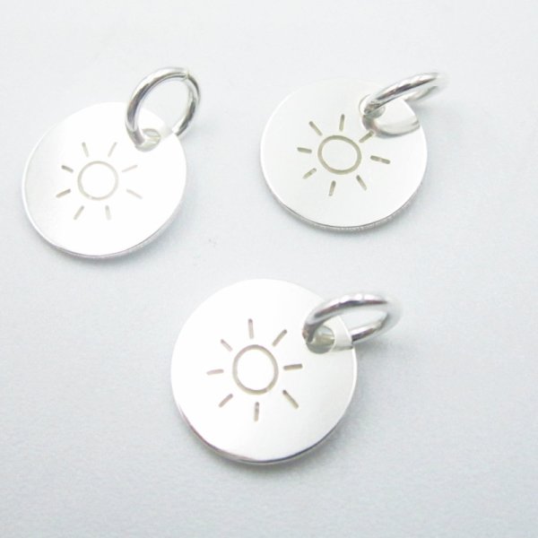 Srebro Ag - blaszka ze słońcem 9mm