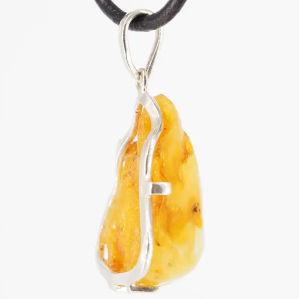 Naturalny Bursztyn mleczny, częściowo polerowany i srebro - naszyjnik na rzemieniu