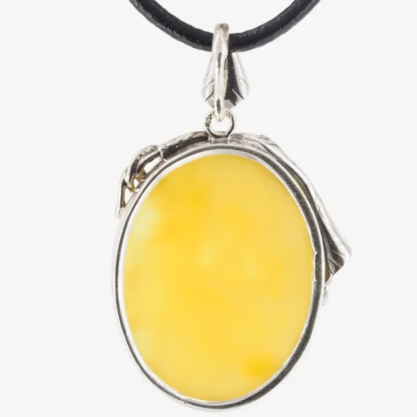 Żółty bursztyn z chmurami i srebro oksydowane - zawieszka z rzemieniem