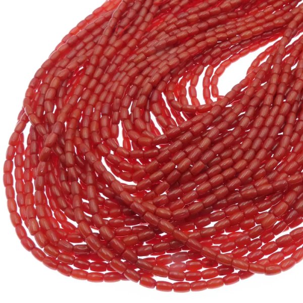 Koral czerwony (jasny odcień) beczki 4x2 mm (sznur)