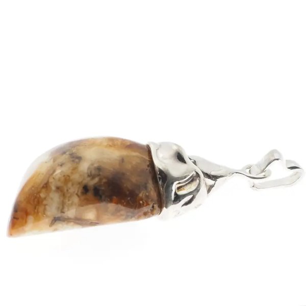Bursztyn i srebro młotkowane - wisiorek