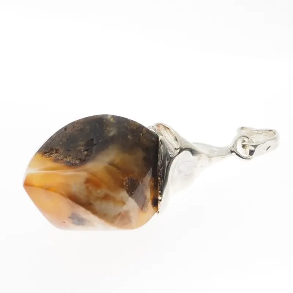 Bursztyn i srebro młotkowane - zawieszka