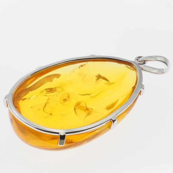 Bursztyn ze szczątkami roślinnymi i srebro - duża zawieszka