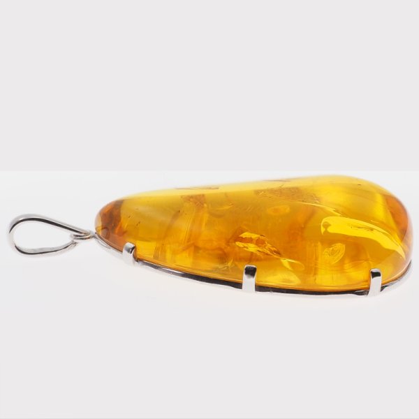 Bursztyn ze szczątkami roślinnymi i srebro - duża zawieszka